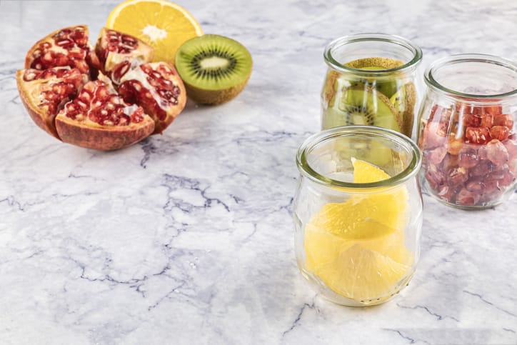 Photo shows an assortment of anti-inflammatory fruit cut on a table/Getty Images